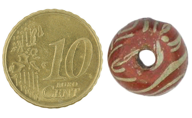 Antique Red & White Islamic Folded Glass Trade Bead - Fustat, Egypt - close-up