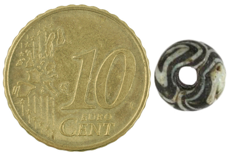 Rare Antique Islamic Folded Glass Bead From Fustat, Egypt - close-up
