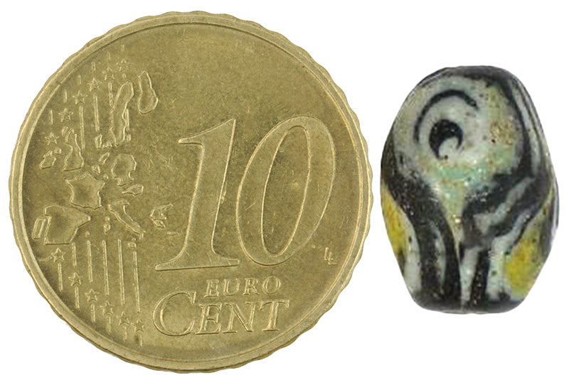 Old Islamic Black, Yellow & White Folded Glass Bead - Fustat, Egypt - close-up